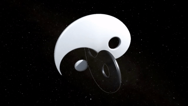 An animated Yin and Yang. They are circling each other at a 90˚ angle. The dots go through the hole on the other piece as it spins around.